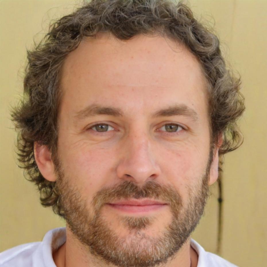 Professional headshot of male financial instructor